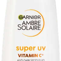 Garnier Ambre Solaire Super UV denný fluid proti tmavým škvrnám s vitamínom C a SPF 50+